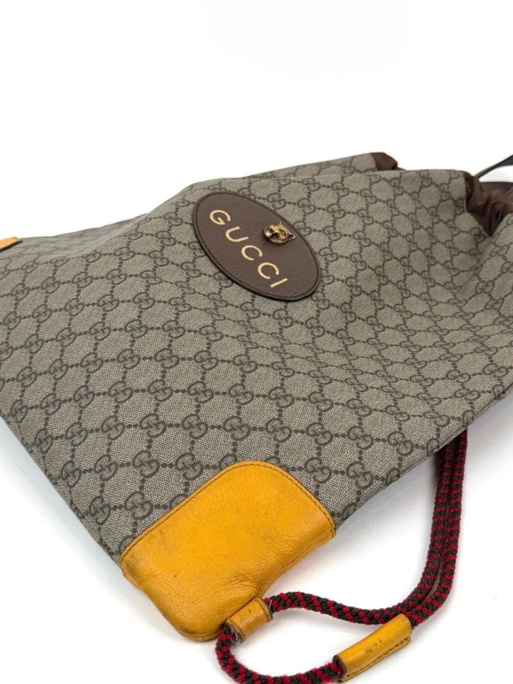 Pre Loved Gucci Beige GG Canvas Drawstring Backpack with Yellow Leather Accents
